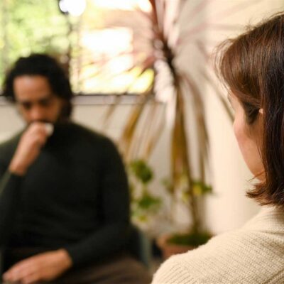 TLP-blurred-visitor-and-listening-volunteer-in-listening-room