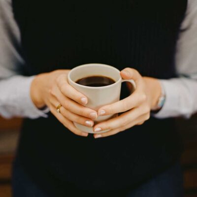 TLP-welcome-volunteer-with-coffee